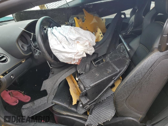2004 Lamborghini Gallardo z VIN ZHWGU11S34LA01652, wystawiony jako Copart lot #49695214 z przebiegiem Nie podano mil oraz Szkoda całkowita • Salvage title. Historia ofert i sprzedaży dostępna na DreamBid. Obrazek 7.