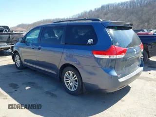 2013 Toyota Sienna XLE AAS with VIN 5TDYK3DC0DS398381, listed as a IAAI auction lot 41773688 with 169,055 mi miles. Bid and sale history available at carsss.com. Image 3.