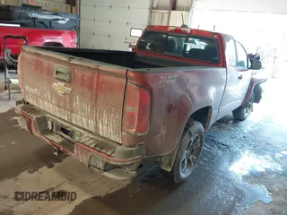 2016 Chevrolet Colorado 4WD Z71 z VIN 1GCHTDE38G1393352, wystawiony jako IAAI lot #41417993 z przebiegiem 100 402 mil mil oraz . Historia ofert i sprzedaży dostępna na DreamBid. Obrazek 4.