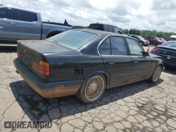 1989 BMW 5 Series with VIN WBAHD1314KBF08237, listed as a Copart auction lot 58951325 with 255,984 mi miles and Clean title. Bid and sale history available at DreamBid. Image 3.