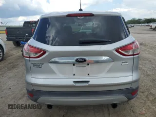 2013 Ford Escape SEL with VIN 1FMCU9HX1DUB15143, listed as a Copart auction lot 56237095 with 127,017 mi miles and Salvage title. Bid and sale history available at DreamBid. Image 6.