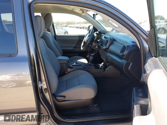 2023 Toyota Tacoma 4WD SR with VIN 3TYCZ5AN1PT146719, listed as a IAAI auction lot 41406963 with 19,735 mi miles. Bid and sale history available at carsss.com. Image 5.