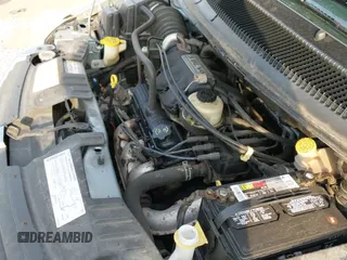 2005 Dodge Caravan SXT with VIN 2D4GP44L45R431950, listed as a IAAI auction lot 43445864 with 135,324 mi miles and . Bid and sale history available at DreamBid. Image 12.