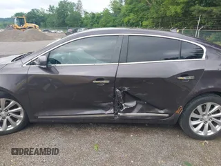 2014 Buick LaCrosse Leather with VIN 1G4GB5G33EF249494, listed as a IAAI auction lot 42538524 with 209,091 mi miles and . Bid and sale history available at DreamBid. Image 14.
