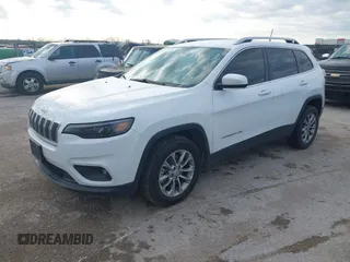 2019 Jeep Cherokee Latitude Plus with VIN 1C4PJLLN2KD171347, listed as a IAAI auction lot 41912894 with 197,233 mi miles and . Bid and sale history available at DreamBid. Image 2.