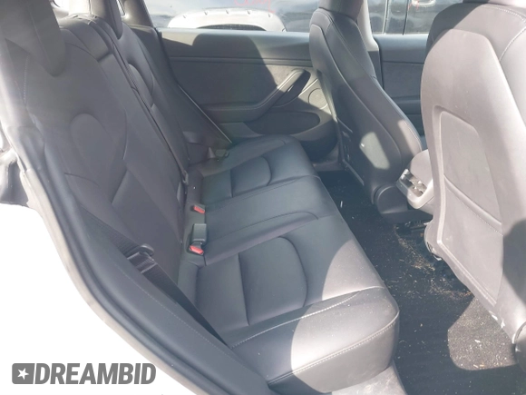 2023 Tesla Model 3 z VIN 5YJ3E1EAXPF543227, wystawiony jako IAAI lot #41150158 z przebiegiem 19 782 mil mil oraz . Historia ofert i sprzedaży dostępna na DreamBid. Obrazek 8.