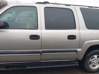 2003 Chevrolet Suburban LT z VIN 3GNFK16Z23G208162, wystawiony jako IAAI lot #41508649 z przebiegiem 329 695 mil mil oraz . Historia ofert i sprzedaży dostępna na DreamBid. Obrazek 13.