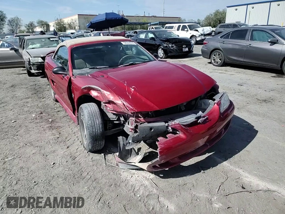 1998 Ford Mustang z VIN 1FAFP4440WF258072, wystawiony jako Copart lot #58944615 z przebiegiem 125 984 mil mil oraz Szkoda całkowita • Salvage title. Historia ofert i sprzedaży dostępna na DreamBid. Obrazek 13.