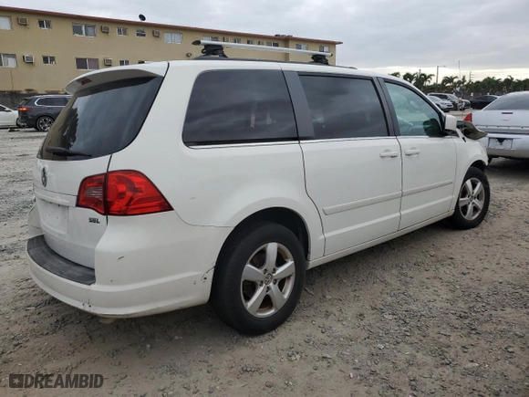 2011 Volkswagen Routan SE with VIN 2V4RW3DG5BR766741, listed as a Copart auction lot 80923713 with 169,703 mi miles and Salvage Title. Bid and sale history available at carsss.com. Image 3.