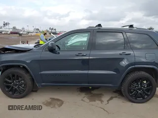 2018 Jeep Grand Cherokee Altitude with VIN 1C4RJFAG4JC122282, listed as a IAAI auction lot 42126483 with 79,184 mi miles and . Bid and sale history available at DreamBid. Image 14.