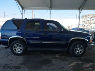 2003 Chevrolet Tahoe LT with VIN 1GNEC13T03J180708, listed as a IAAI auction lot 41543671 with 203,442 mi miles. Bid and sale history available at carsss.com. Image 12.