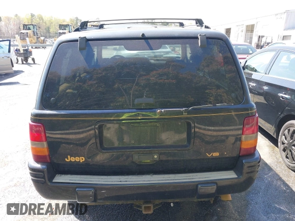 1997 Jeep Grand Cherokee Limited with VIN 1J4GZ78Y1VC658515, listed as a IAAI auction lot 41897266 with 164,033 mi miles and . Bid and sale history available at DreamBid. Image 16.