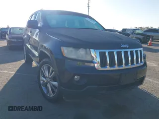 2013 Jeep Grand Cherokee Laredo with VIN 1C4RJEAG2DC643290, listed as a IAAI auction lot 41751696 with 125,258 mi miles. Bid and sale history available at carsss.com. Image 1.