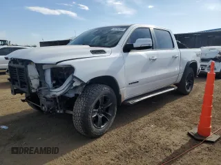 2020 Ram 1500 Lone Star with VIN 1C6SRFFT8LN301875, listed as a Copart auction lot 53752555 with 64,870 mi miles and Salvage title. Bid and sale history available at DreamBid. Image 1.