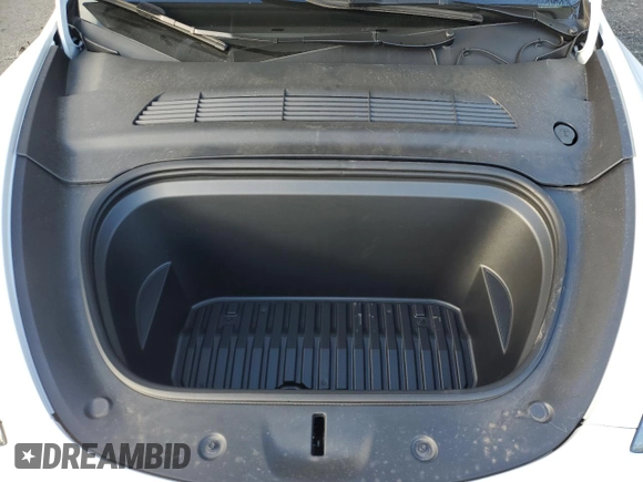 2023 Tesla Model Y Long Range with VIN 7SAYGAEE1PF967353, listed as a Copart auction lot 88700135 with 16,249 mi miles and Salvage Title. Bid and sale history available at DreamBid. Image 12.