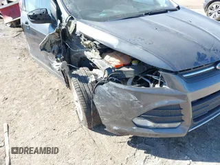 2016 Ford Escape SE with VIN 1FMCU0G73GUC76322, listed as a IAAI auction lot 41796746 with 61,821 mi miles. Bid and sale history available at carsss.com. Image 6.