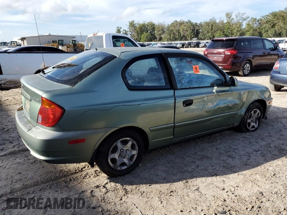 2005 Hyundai Accent GLS with VIN KMHCG35C75U328380, listed as a Copart auction lot 74935354 with 4,848 mi miles and Salvage Title. Bid and sale history available at carsss.com. Image 3.