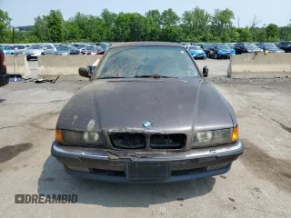 1995 BMW 7 Series 740i with VIN WBAGF6325SDH05563, listed as a Copart auction lot 60356245 with 153,155 mi miles and Clean title. Bid and sale history available at DreamBid. Image 5.