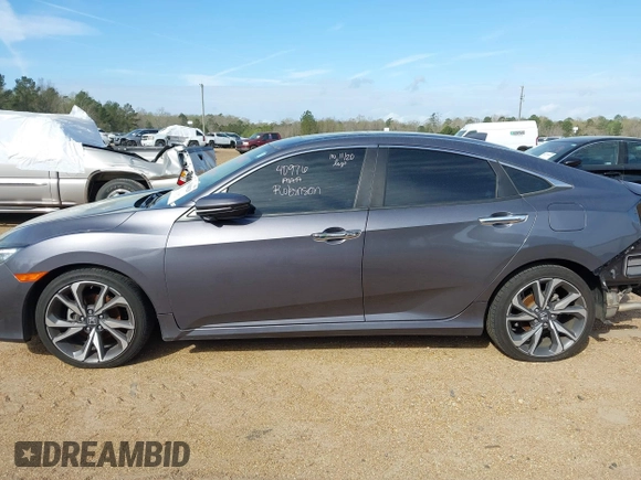 2020 Honda Civic Sedan Touring with VIN 19XFC1F97LE001901, listed as a IAAI auction lot 41048129 with 67,027 mi miles. Bid and sale history available at carsss.com. Image 14.
