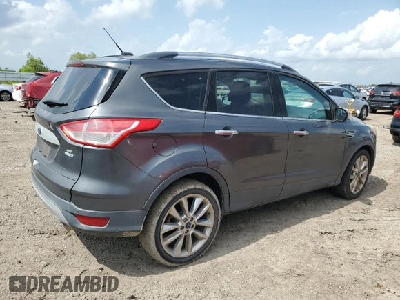 2015 Ford Escape SE with VIN 1FMCU9G95FUC30303, listed as a Copart auction lot 54247645 with 73,944 mi miles and Salvage Title. Bid and sale history available at DreamBid. Image 3.