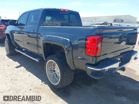 2018 Chevrolet Silverado 1500 LT with VIN 3GCPCREC1JG127396, listed as a IAAI auction lot 41790850 with 138,725 mi miles and . Bid and sale history available at DreamBid. Image 3.