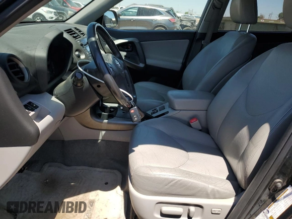 2010 Toyota RAV4 Limited with VIN JTMDK4DV1AD013438, listed as a Copart auction lot 63256435 with 168,175 mi miles and Salvage title. Bid and sale history available at DreamBid. Image 7.