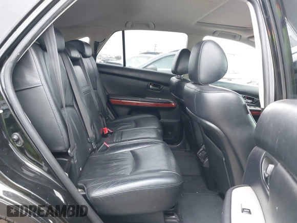 2007 Lexus RX 400h with VIN JTJGW31U972003233, listed as a IAAI auction lot 41732449 with 149,523 mi miles and . Bid and sale history available at DreamBid. Image 8.