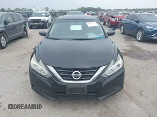 2016 Nissan Altima SV with VIN 1N4AL3AP7GC293869, listed as a IAAI auction lot 41933839 with 98,047 mi miles and . Bid and sale history available at DreamBid. Image 13.