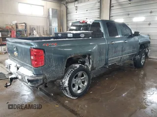 2014 Chevrolet Silverado 1500 LTZ with VIN 1GCVKSEC7EZ268271, listed as a IAAI auction lot 41589223 with 147,866 mi miles and . Bid and sale history available at DreamBid. Image 4.