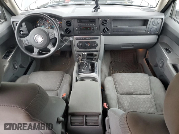 2007 Jeep Commander Sport z VIN 1J8HG48K97C527502, wystawiony jako Copart lot #52362625 z przebiegiem 156 639 mil mil oraz Czysty tytuł • Clean title. Historia ofert i sprzedaży dostępna na DreamBid. Obrazek 8.