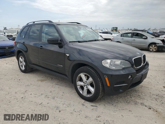 2012 BMW X5 35i with VIN 5UXZV4C50CL750118, listed as a Copart auction lot 53302375 with 102,917 mi miles and Clean title. Bid and sale history available at DreamBid. Image 4.