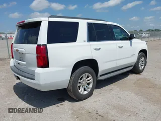 2015 Chevrolet Tahoe LS z VIN 1GNSCAKC6FR239156, wystawiony jako IAAI lot #42545513 z przebiegiem 117 863 mil mil oraz . Historia ofert i sprzedaży dostępna na DreamBid. Obrazek 4.