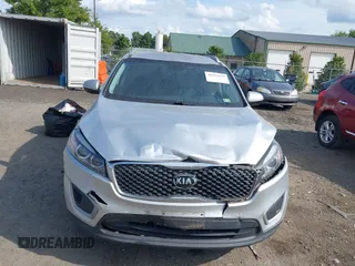2018 Kia Sorento LX with VIN 5XYPGDA3XJG427112, listed as a IAAI auction lot 40303681 with 170,443 mi miles. Bid and sale history available at carsss.com. Image 12.