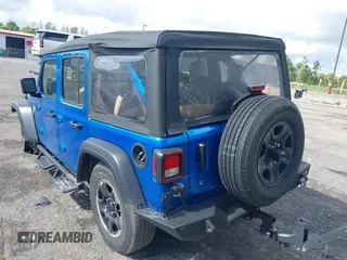 2022 Jeep Wrangler Unlimited Sport with VIN 1C4HJXDG3NW117155, listed as a IAAI auction lot 40240879 with 36,323 mi miles and . Bid and sale history available at DreamBid. Image 3.