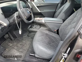 2023 BMW iX xDrive50 with VIN WB523CF01PCM76013, listed as a Copart auction lot 48326965 with 18,923 mi miles and Salvage Title. Bid and sale history available at carsss.com. Image 7.