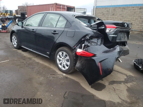 2023 Toyota Corolla Hybrid LE with VIN JTDBDMHE2P3002183, listed as a Copart auction lot 50292785 with 7,065 mi miles and Salvage Title. Bid and sale history available at carsss.com. Image 2.