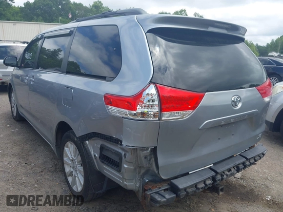 2013 Toyota Sienna LE with VIN 5TDJK3DC9DS054310, listed as a IAAI auction lot 42668103 with 209,712 mi miles and . Bid and sale history available at DreamBid. Image 3.
