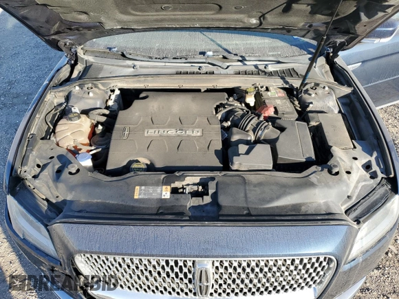 2017 Lincoln Continental Premiere z VIN 1LN6L9PK0H5611296, wystawiony jako Copart lot #75131974 z przebiegiem 60 008 mil mil oraz Szkoda całkowita • Salvage title. Historia ofert i sprzedaży dostępna na DreamBid. Obrazek 13.