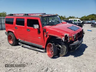 2004 Hummer H2 with VIN 5GRGN23U04H116668, listed as a Copart auction lot 41477165 with 0 mi miles and Salvage Title. Bid and sale history available at carsss.com. Image 4.