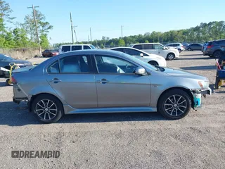 2015 Mitsubishi Lancer SE with VIN JA32V2FWXFU023626, listed as a IAAI auction lot 42012381 with 143,981 mi miles. Bid and sale history available at carsss.com. Image 13.