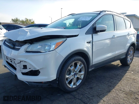 2013 Ford Escape SE with VIN 1FMCU0GX3DUB96899, listed as a IAAI auction lot 42266671 with 92,181 mi miles and . Bid and sale history available at DreamBid. Image 2.