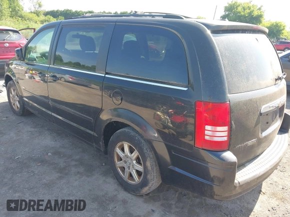 2008 Chrysler Town & Country Touring with VIN 2A8HR54P48R736561, listed as a IAAI auction lot 42562758 with 187,852 mi miles and . Bid and sale history available at DreamBid. Image 3.