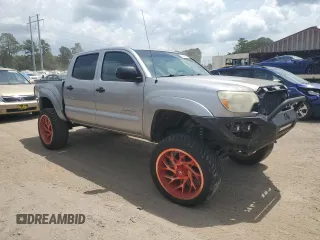 2015 Toyota Tacoma with VIN 5TFLU4EN5FX132006, listed as a Copart auction lot 59285655 with 205,932 mi miles and Salvage title. Bid and sale history available at DreamBid. Image 4.