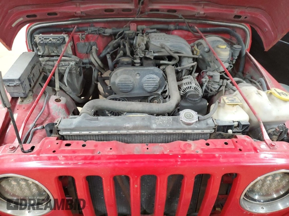 2004 Jeep Wrangler SE с VIN 1J4FA29164P771472, выставлен на аукционе Copart как лот 48162335 с пробегом 175 764 миль миль и Списание • Salvage title. История ставок и продаж доступна на DreamBid. Изображение 11.