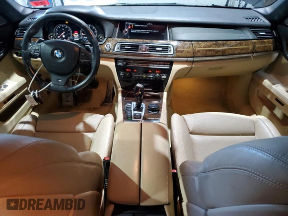 2015 BMW 7 Series 750i xDrive with VIN WBAYB6C57FD965931, listed as a Copart auction lot 44422205 with 100,702 mi miles and Salvage title. Bid and sale history available at DreamBid. Image 8.