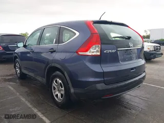 2014 Honda CR-V LX with VIN 3CZRM3H39EG703959, listed as a IAAI auction lot 41990964 with 87,424 mi miles. Bid and sale history available at carsss.com. Image 3.