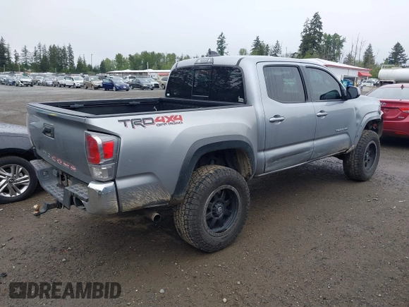 2020 Toyota Tacoma SR5 z VIN 3TMCZ5AN8LM323918, wystawiony jako IAAI lot #42279462 z przebiegiem 105 923 mil mil oraz . Historia ofert i sprzedaży dostępna na DreamBid. Obrazek 4.
