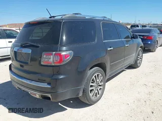 2014 GMC Acadia Denali with VIN 1GKKRTKD1EJ158482, listed as a IAAI auction lot 41826579 with 167,043 mi miles. Bid and sale history available at carsss.com. Image 4.