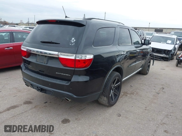 2011 Dodge Durango Citadel with VIN 1D4SE5GTXBC695700, listed as a IAAI auction lot 41381731 with 152,055 mi miles. Bid and sale history available at carsss.com. Image 4.