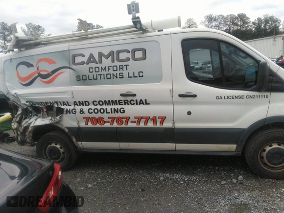 2016 Ford Transit Cargo with VIN 1FTYR1ZM7GKA14464, listed as a IAAI auction lot 41230405 with 120,604 mi miles and . Bid and sale history available at DreamBid. Image 13.